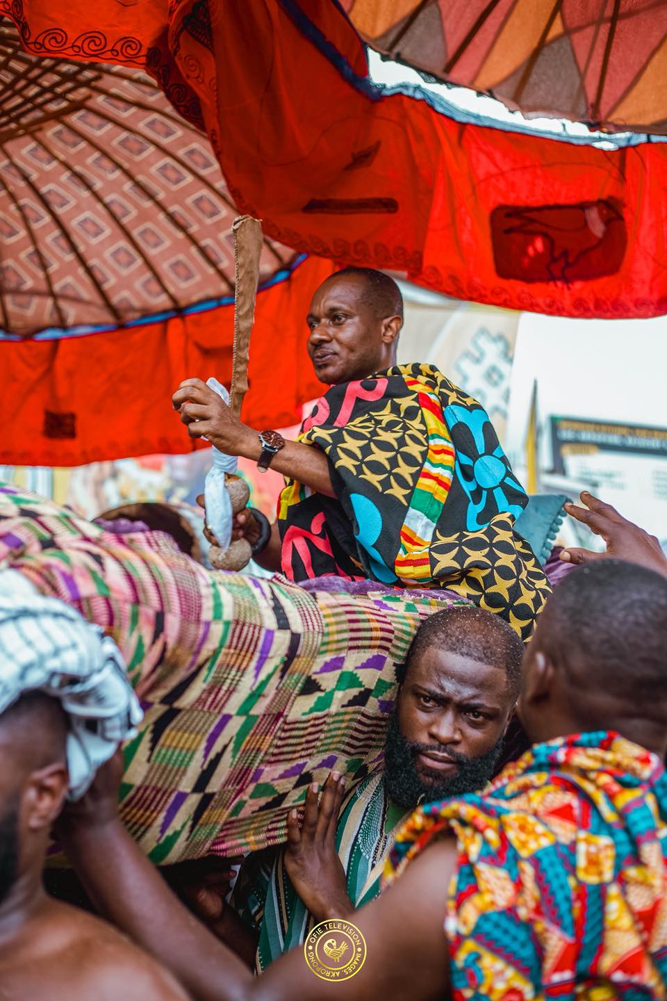 The Krontihene carried in palanquin beneath a state umbrella during a durbar at Akropong